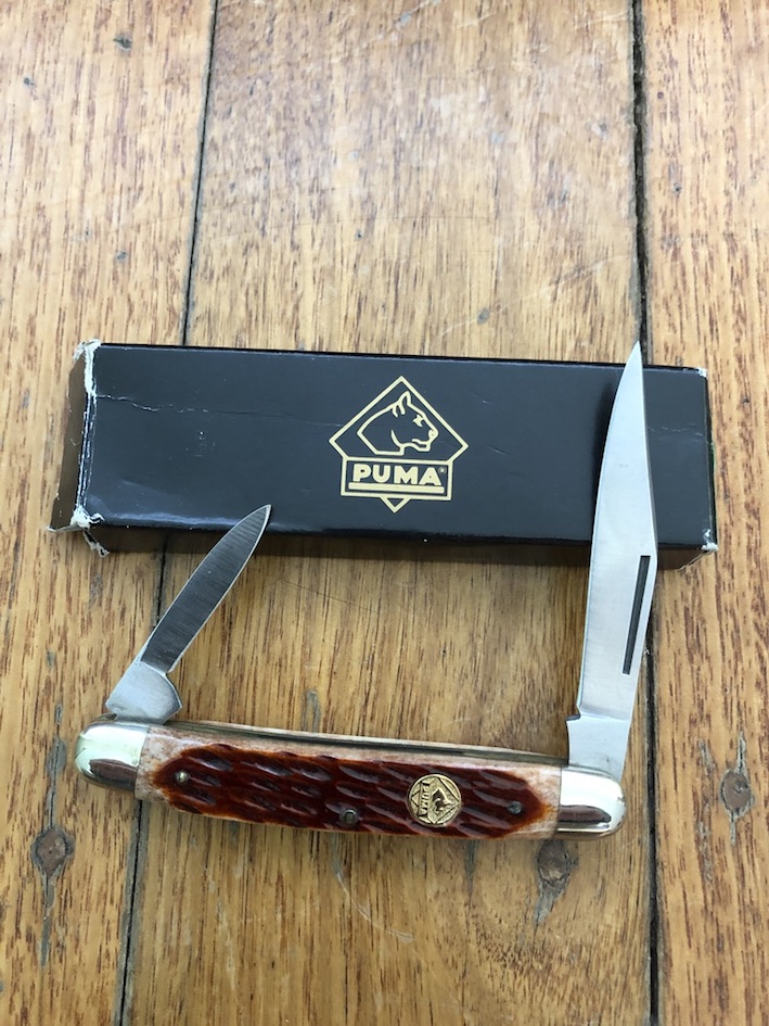 Puma Knife: Puma Bantam Folding Knife with Red Bone Handle Circa early 2000