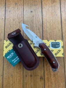 Buck Knife: 2008 Buck Gut Hook Alpha Hunter Folding Knife with Rosewood Laminated Handle & Pouch