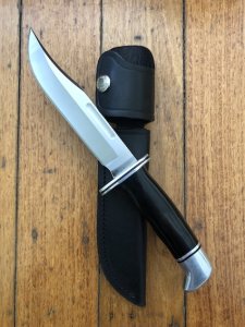 Buck Knife: Buck 2006 Model 119 Special Hunting Knife with Leather Sheath